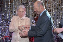 photo of Dr. Fran Smith and Eddie Dziuk accepting 2018 President's Award