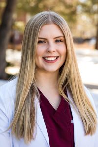 head shot of Caitlyn Callaghan in her white lab coat