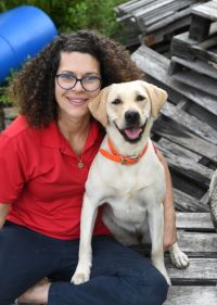 photo of Dr. Cindy Otto and yellow Labrador Retriever Moxie