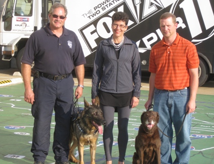 Dr. Otto with dogs from her study and their handlers