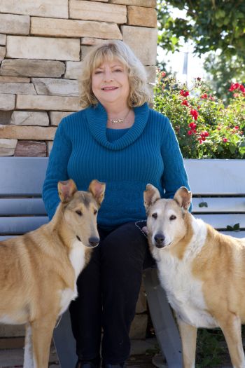 photo of Robette Johns with two of her Collies