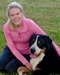Photo of Sue Copeland and her Greater Swiss Mountain Dog 'Gus'
