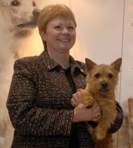 Photo of Ann Viklund with her Norwich Terrier Trixie